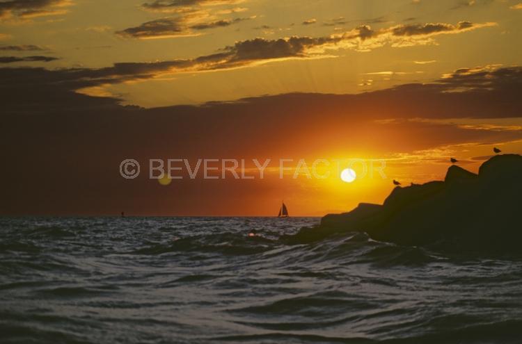 Island;Sunset;sky;sun;water;red;sillouettes;ocean;yellow;dana point